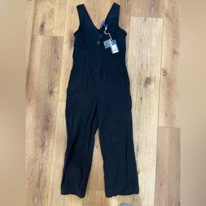 Black universal thread jumpsuit new with tags